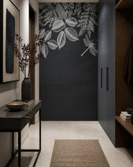Chalkboard botanical wallpaper in an architectural hallway.