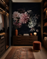 Dark floral bouquet wallpaper in a walk-in wardrobe.