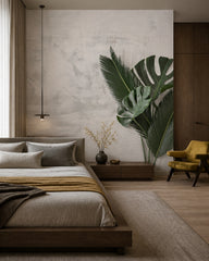 Monstera leaf wallpaper in a designer bedroom.