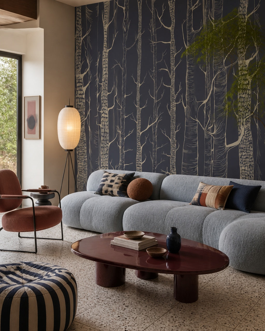 Golden trees on navy wallpaper in a designer living room.