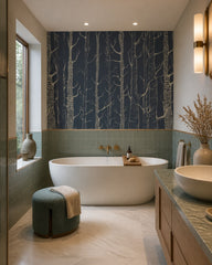Golden trees on navy wallpaper in a luxury bathroom.
