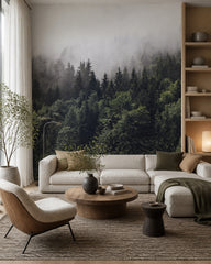 Misty pine forest wallpaper in a designer living room.