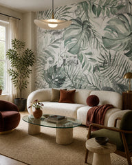 Monstera leaves wallpaper in a designer living room.