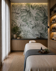 Monstera leaves wallpaper in a wellness spa.