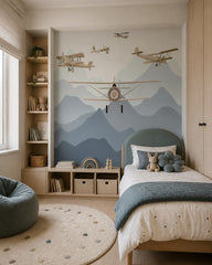 Vintage airplanes over the mountains kids room wallpaper in a girl’s bedroom.