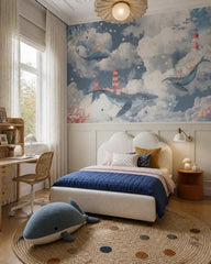 Whales in the clouds wallpaper in a girl’s bedroom.