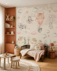 Bunny pilots and moon wallpaper in a toddler bedroom with a child-sized bed.
