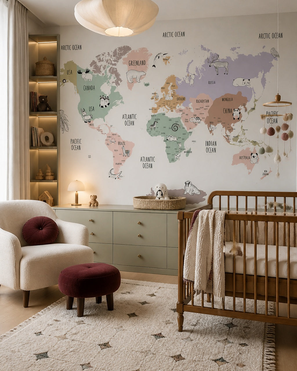 Pastel animals of the world educational map mural in a modern nursery with a crib.