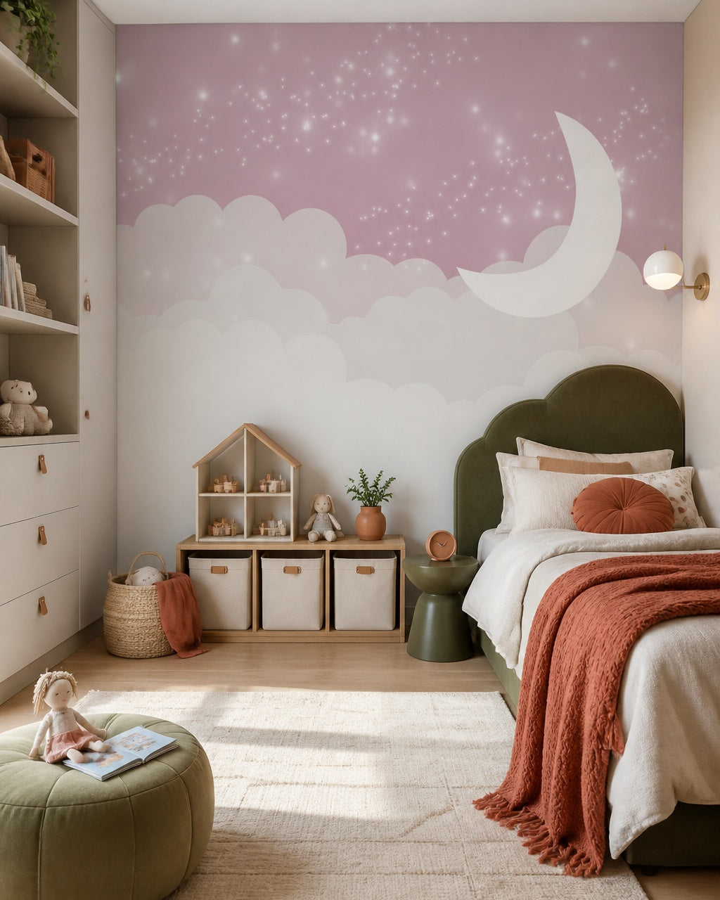 Pink moon, clouds & twinkling stars nursery wall mural in a girl’s bedroom.