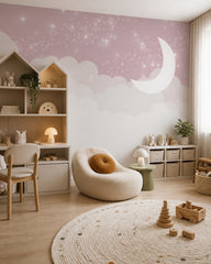 Pink moon, clouds & twinkling stars nursery wall mural in a children’s playroom.