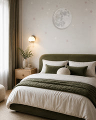 Soft moon and stars wallpaper in a designer bedroom.