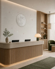 Soft moon and stars wallpaper at a hotel reception desk.