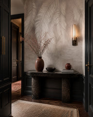 Neutral feathers wallpaper in a designer entrance hall.