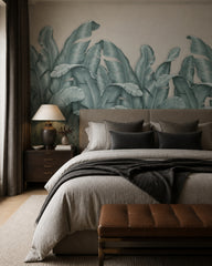 Sage banana leaves wallpaper in a designer bedroom.