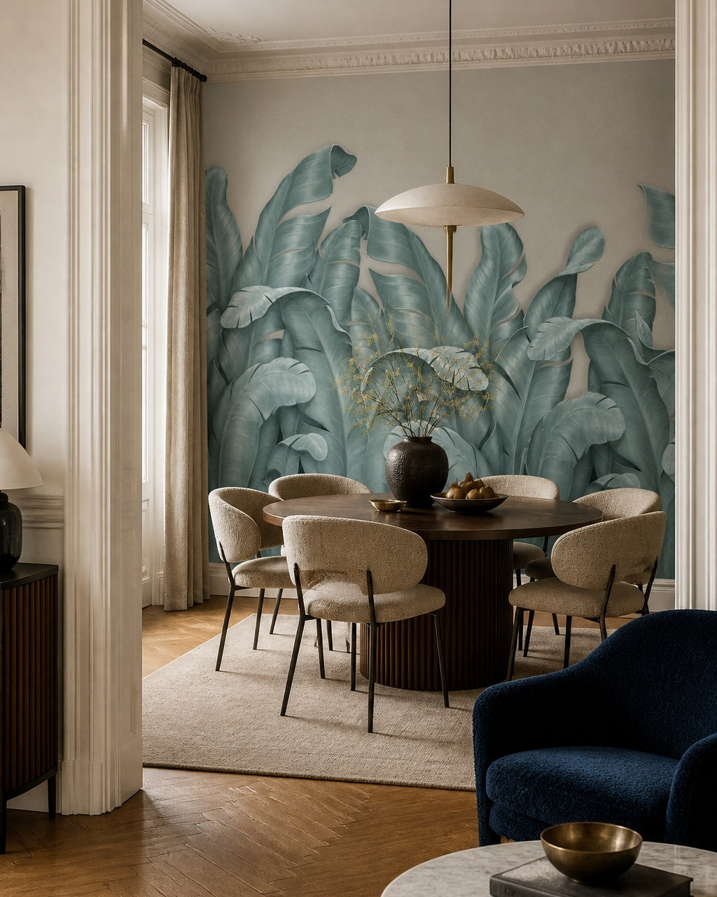 Sage banana leaves wallpaper in a refined dining area.