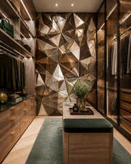 Gold 3D geometric wallpaper in a walk-in wardrobe.