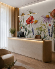 Watercolor wildflowers wallpaper at a hotel reception desk.
