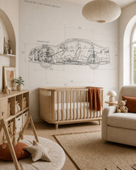 Car blueprint wallpaper in a modern nursery with a crib.