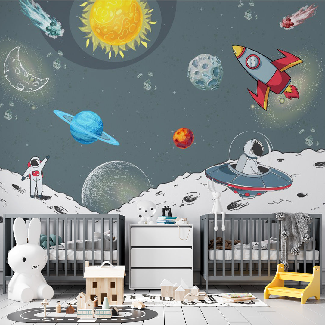 Illustrated kids room wallpaper with astronauts on the moon, a rocket, flying saucer, colorful planets, meteors, stars, and a golden sun.