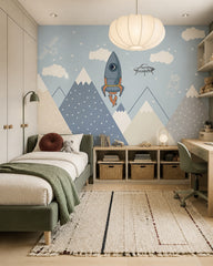 Space adventures above the mountains kids room wallpaper in a boy’s bedroom.
