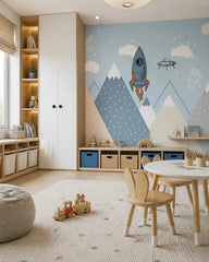 Space adventures above the mountains kids room wallpaper in a children’s playroom.