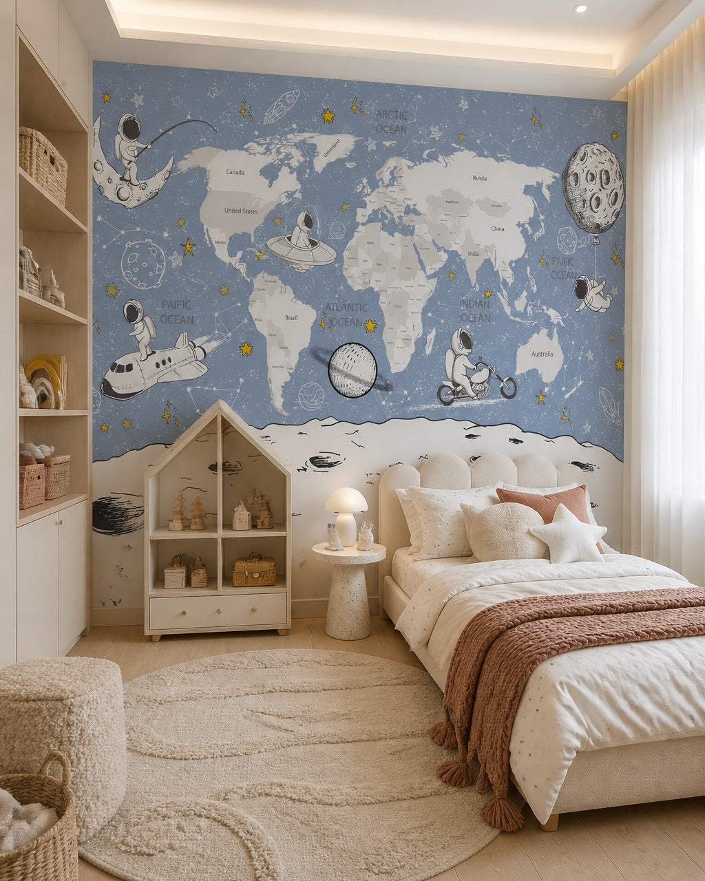 Blue cosmic world map & astronauts kids’ wall mural in a girl’s bedroom.