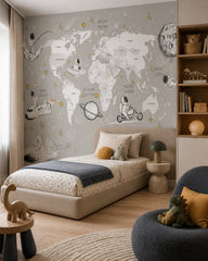 Astronaut adventure world map kids’ wall mural in a boy’s bedroom.