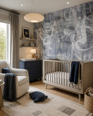 Grey music notes wallpaper in a nursery with a wooden crib and a navy dresser.