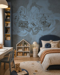Blue graffiti music wallpaper in a bedroom with a navy headboard and a study desk.