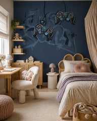 Navy gamer wallpaper with game controllers in a bedroom with a rattan bed and a canopy.