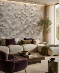 White 3D hexagon wallpaper in a designer living room.