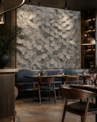 White 3D hexagon wallpaper in a restaurant.