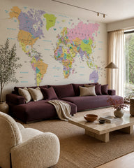 Colorful political world map wallpaper in a designer living room.