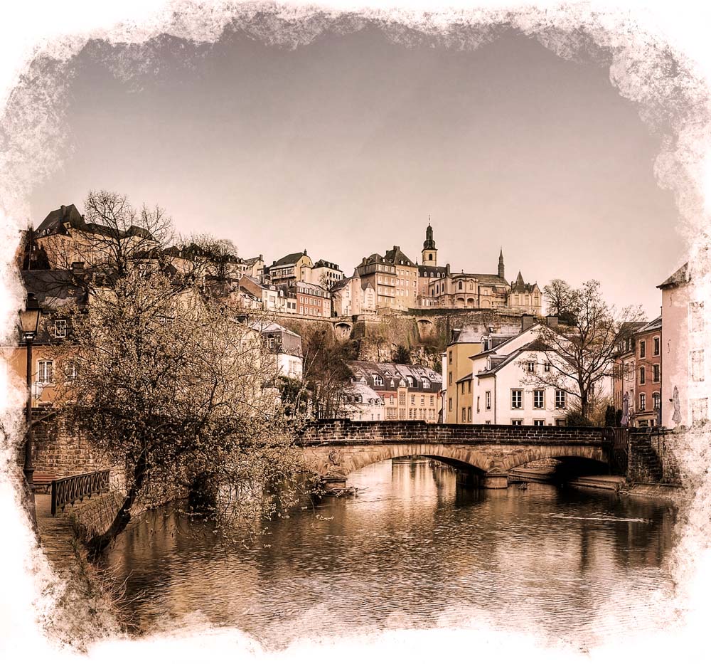 Vintage European Village Wall Mural - Scenic Riverside and Historic Hilltop Town