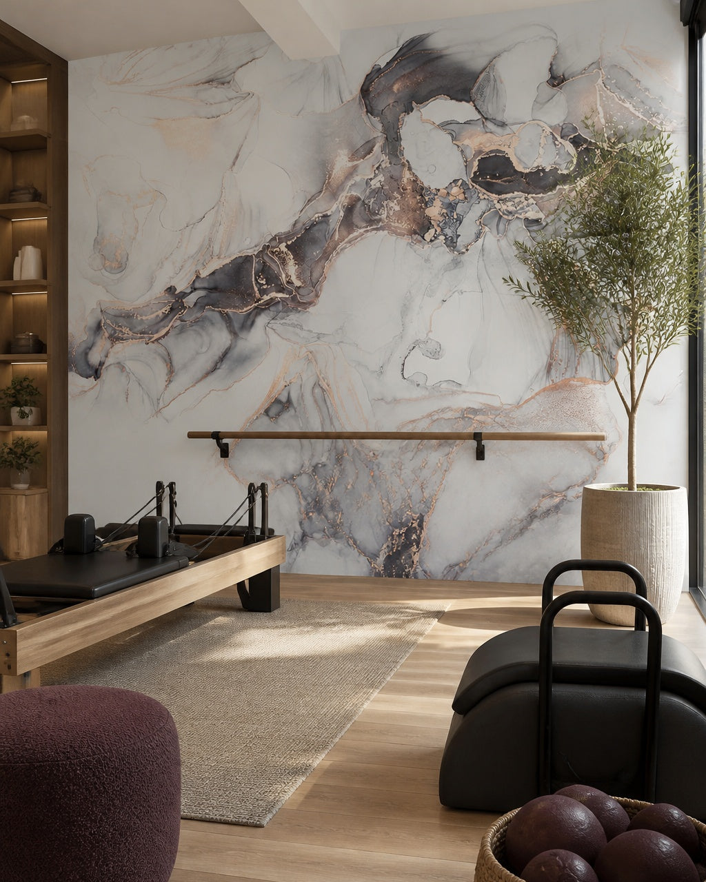 Smoky quartz & rose gold geode wall mural in a fitness studio.
