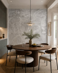 Grey leaf line art wallpaper in a refined dining area.