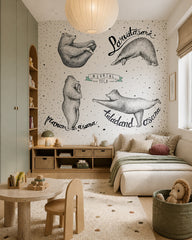Yoga asana bears wallpaper in a toddler bedroom with a child-sized bed.