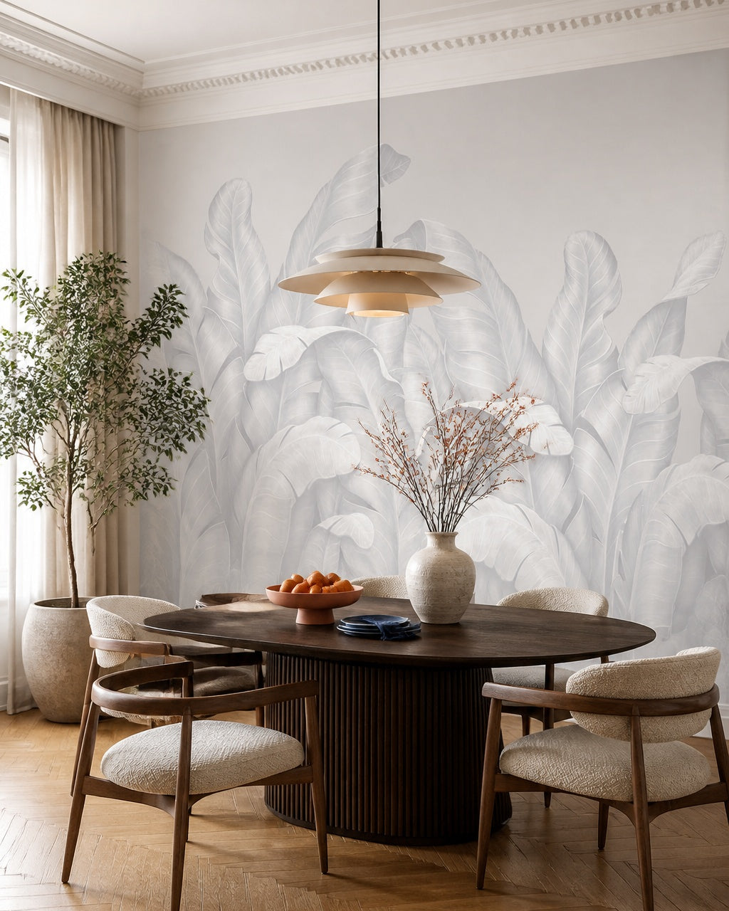 Pale blue banana leaves wallpaper in a refined dining area.