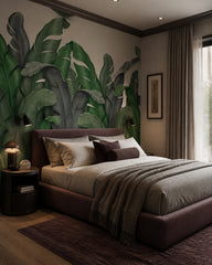 Green banana leaves wallpaper in a designer bedroom.