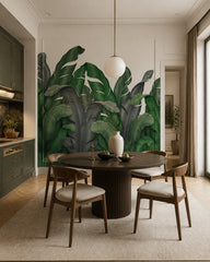 Green banana leaves wallpaper in a refined dining area.