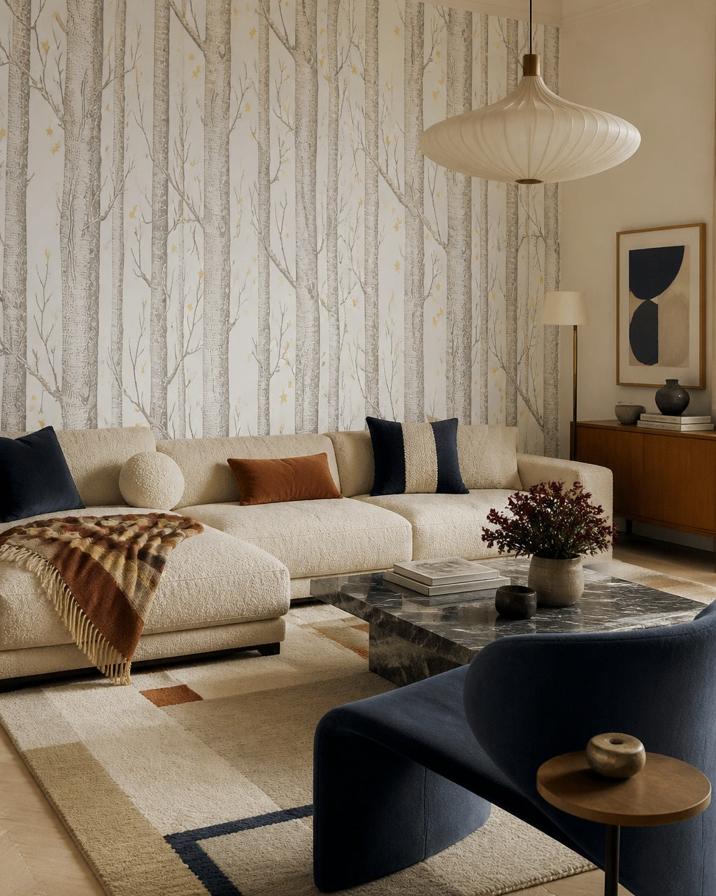 Birch forest wallpaper in a designer living room.