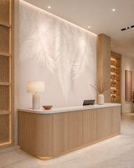 White feathers wallpaper at a hotel reception desk.