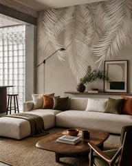 Silver palm leaf wallpaper in a designer living room.