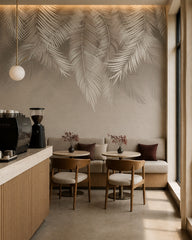 Silver palm leaf wallpaper in a specialty coffee shop.