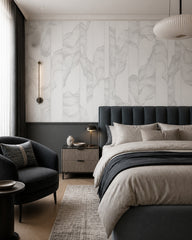 Grey line art leaves wallpaper in a designer bedroom.