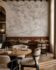Overlapping tree branches wallpaper in a restaurant.
