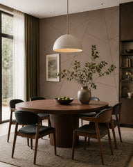 Taupe geometric lines wallpaper in a refined dining area.