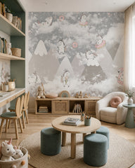 Playful unicorns above the mountains nursery wallpaper in a children’s playroom.