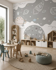 Bunny astronaut, rocket & planets space wall mural in a children’s playroom.