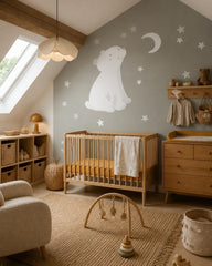 Polar bear wallpaper in a modern nursery with a crib.